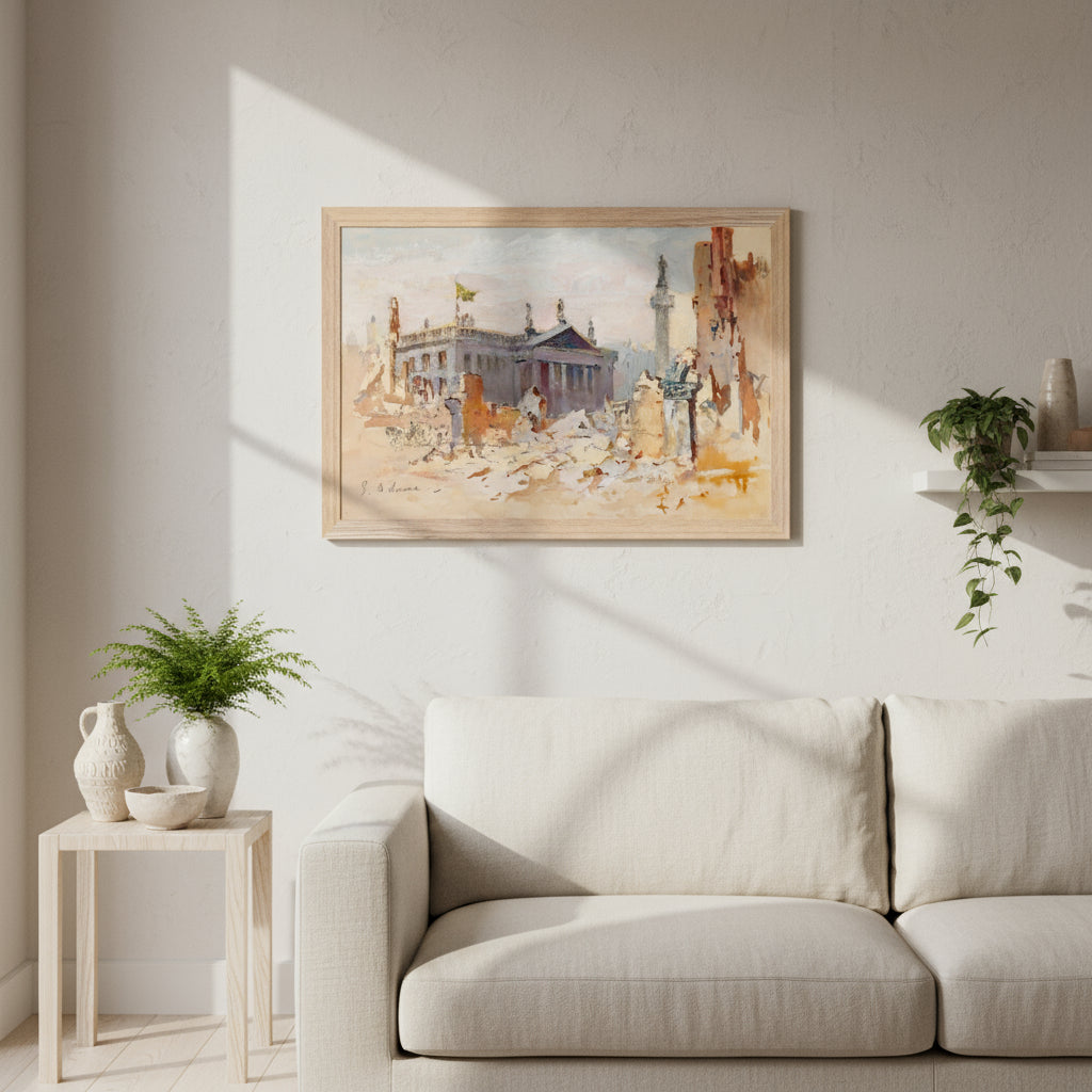The Ruins of O’Connell Street, 1916 by Edmond Delrenne, art print in a natural wooden frame, showing the devastation of O’Connell Street following the Easter Rising. The Collector’s Edition print in a natural oak frame hanging above a linen sofa in a minimalist modern home. Pale plaster walls, neutral tones, Irish ceramics and plants nearby. Soft daylight accentuates texture and detail of archival paper.