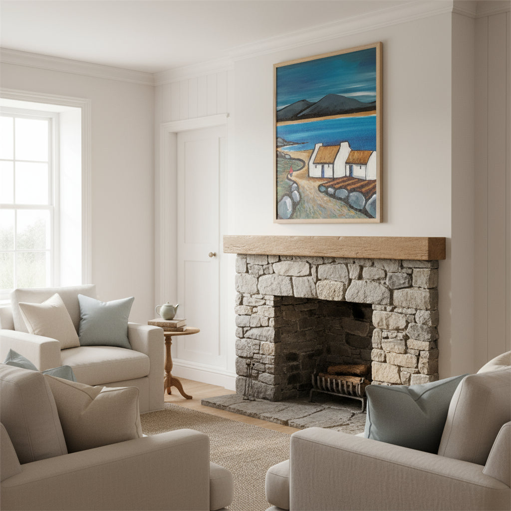 Connemara Lakes Cottage Irish landscape art print framed in natural oak displayed above stone fireplace in luxury living room