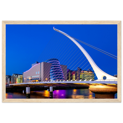 Enchanting Dublin skyline at night: Samuel Beckett Bridge & Convention Centre lights reflected on River Liffey. Framed art print captures city's magic.