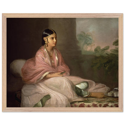 Irish artist Thomas Hickey Indian Lady framed-giclee. Framed painting of a woman in traditional attire sitting on a couch with a decorative background.