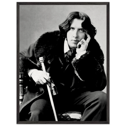 Oscar Wilde vintage portrait displayed in a study or library setting
