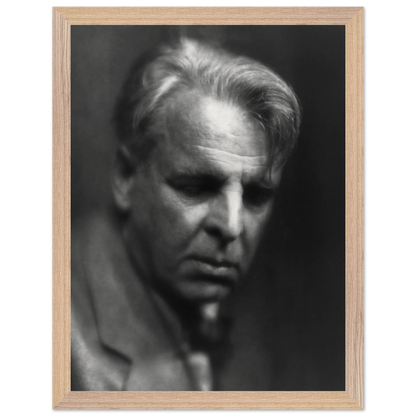 William Butler Yeats portrait displayed in home library or study setting.